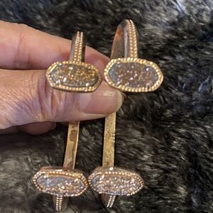 A set of Kendra Scott Gold and Brown Stone Bracelets